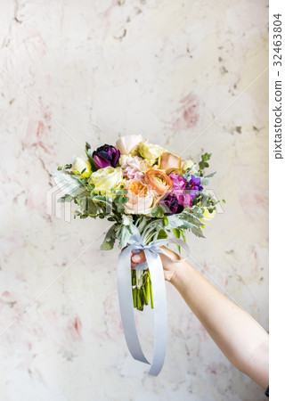 Hand Holding Fresh Real Flowers Bouquet Hand Holding Fresh Real Flowers Bouquet 32463804