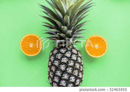 Orange and pineapple tropical fruit 32463950