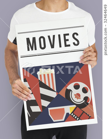Man holding banner of movies theatre media entertainment Man holding banner of movies theatre media entertainment 32464649