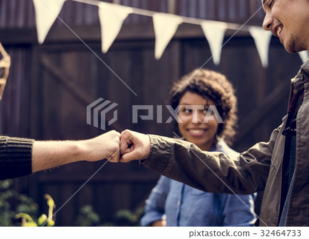 People fist bump hands sign power support 32464733