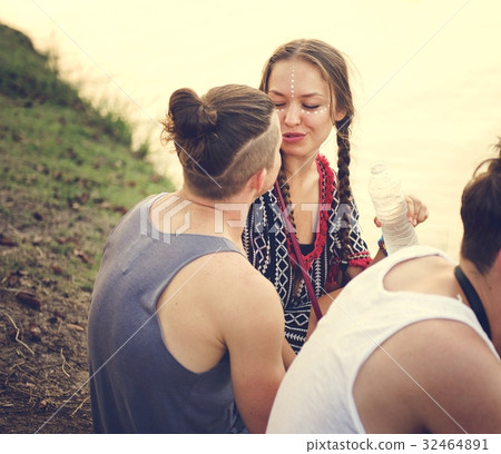 Group of Friends Drinking Beers Enjoying Music Festival together 32464891