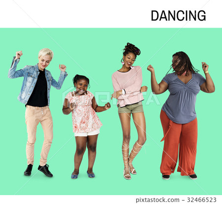 Group of women dancing happiness fun with music 32466523