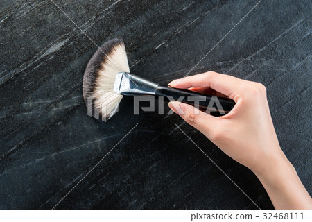 female beauty hand holding professional brush female beauty hand holding professional brush 32468111