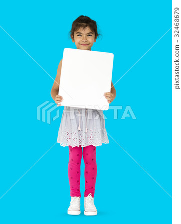 Happiness little girl smiling holding blank placard Happiness little girl smiling holding blank placard 32468679
