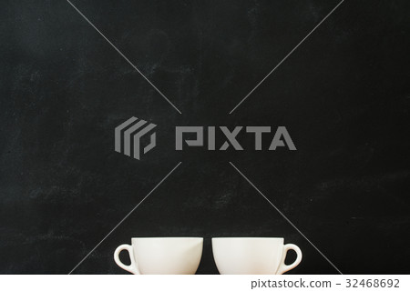 coffee cups showing at the bottom of the black coffee cups showing at the bottom of the black 32468692