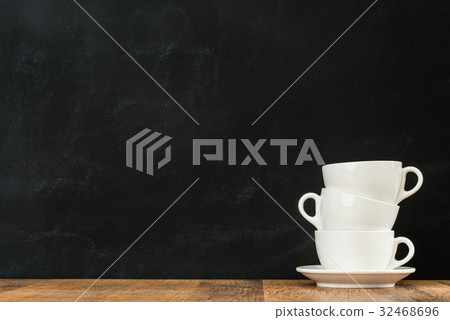 clean latte coffee cups stacked in the black clean latte coffee cups stacked in the black 32468696