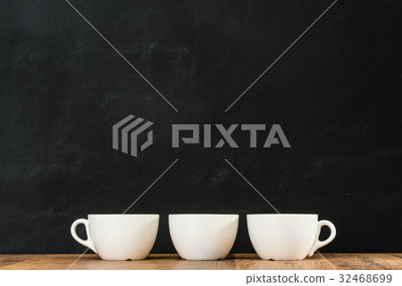 white coffee cups are arranged together placed white coffee cups are arranged together placed 32468699