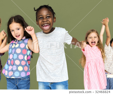Group of happiness little children holding hand together Group of happiness little children holding hand together 32468824