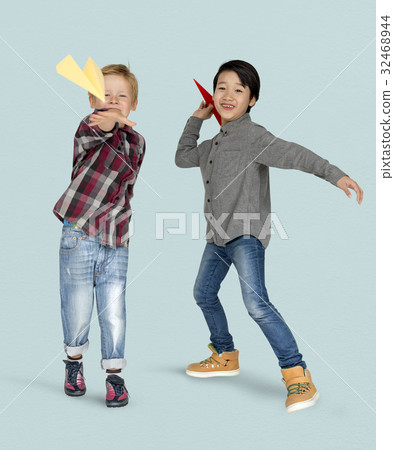 Little Boys Holding Paper Plane Studio Portrait Little Boys Holding Paper Plane Studio Portrait 32468944