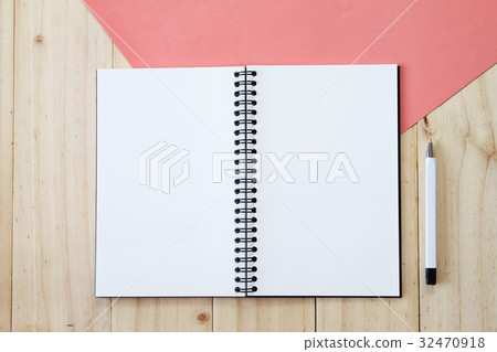 Notebook and pen on wooden background 32470918