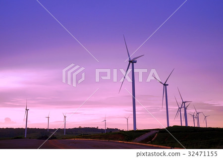 Wind turbine farm during beautiful sunset 32471155