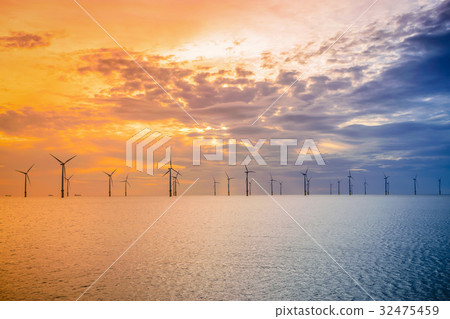 Sunset Offshore Wind Turbine in a Wind farm Sunset Offshore Wind Turbine in a Wind farm 32475459