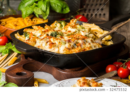 Baked pasta with broccoli, cauliflower, cheese and Baked pasta with broccoli, cauliflower, cheese and 32475532