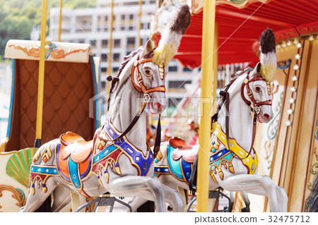 Horses on a carnival Merry Go Round. Old French Horses on a carnival Merry Go Round. Old French 32475712