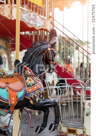 Horses on a carnival Merry Go Round. Old French Horses on a carnival Merry Go Round. Old French 32475765