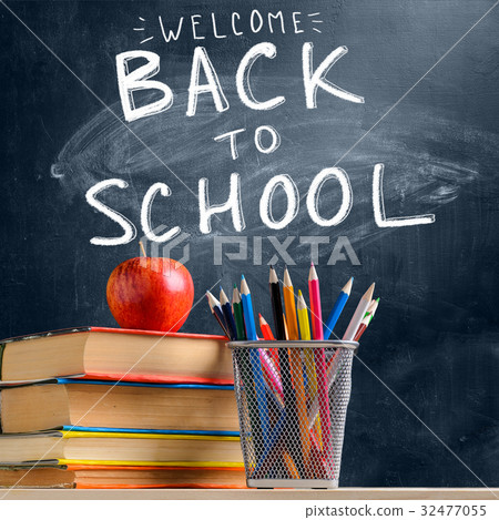 School accessories against blackboard 32477055