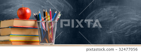 School accessories against blackboard 32477056