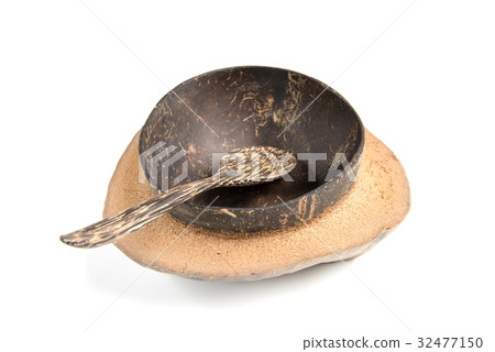 bowl made from Coconut shell with wooden spoon bowl made from Coconut shell with wooden spoon 32477150