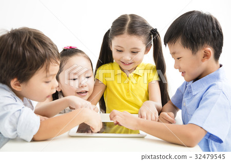 group of school kids studying with tablet group of school kids studying with tablet 32479545