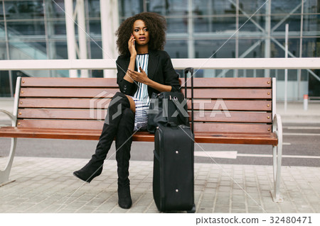 Surprised afro-american woman is waiting for a Surprised afro-american woman is waiting for a 32480471