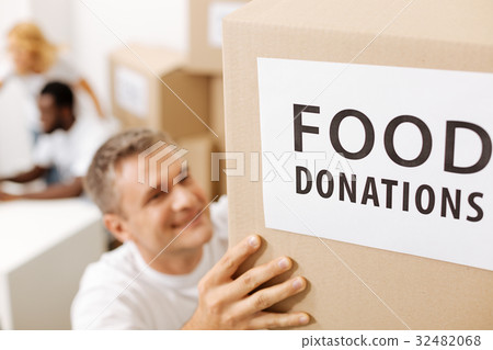 Dedicated generous man shipping supplies for the 32482068