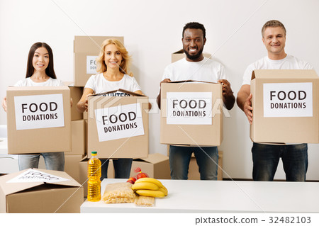 Active sincere people making their contribution to 32482103