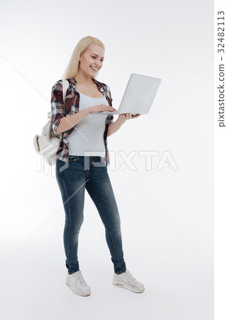Delighted woman expressing positivity during 32482113