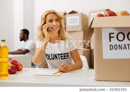 Active productive woman calling from charitable 32482391