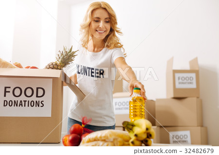 Generous gorgeous woman working for charitable 32482679