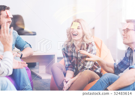 Overjoyed smiling colleagues resting in the office Overjoyed smiling colleagues resting in the office 32483614