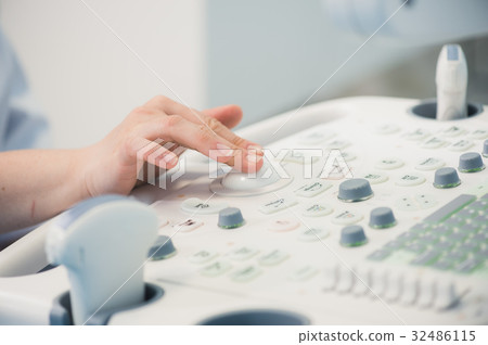 young woman doctor's hands close up preparing for 32486115