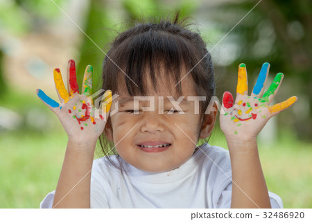 Cute little girl with hands painted  32486920