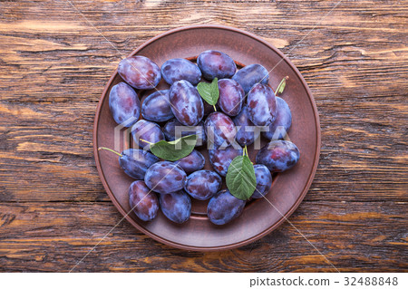 plums on the table 32488848