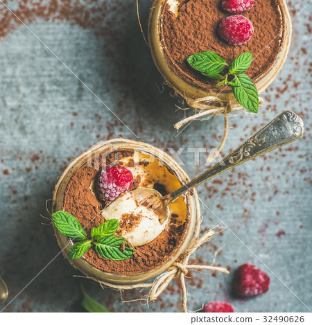 Homemade Tiramisu in glasses with berries and mint Homemade Tiramisu in glasses with berries and mint 32490626