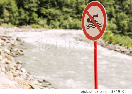 Don't swim sign. Mountainng river. Concept of Don't swim sign. Mountainng river. Concept of 32491001