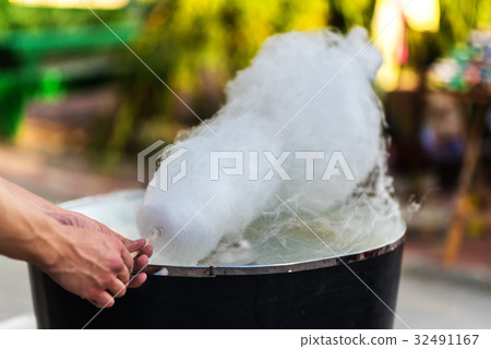 The process of making cotton candy, close-up The process of making cotton candy, close-up 32491167