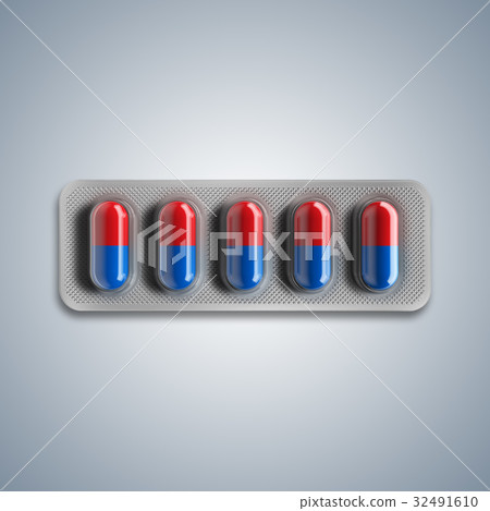 Red and blue pills in a blister on gray background Red and blue pills in a blister on gray background 32491610
