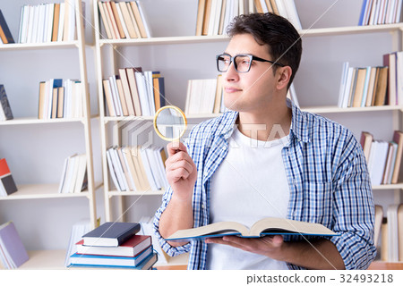 Young student with books preparing for exams 32493218
