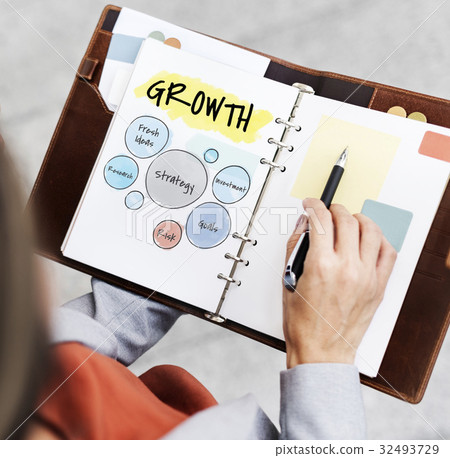 Hand working on notepad network graphic overlay Hand working on notepad network graphic overlay 32493729