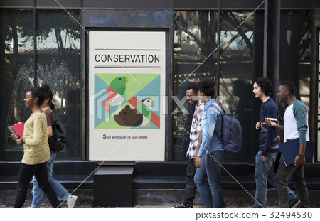 Diverse group of young people with save animals banner Diverse group of young people with save animals banner 32494530