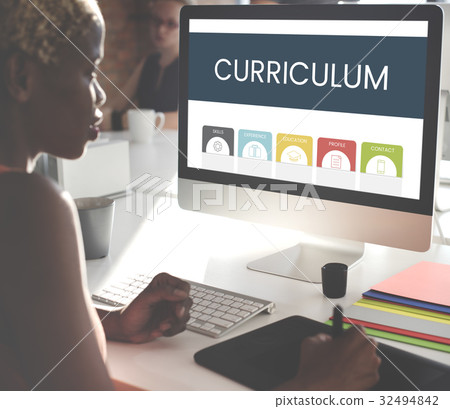 African woman working using computer screen and mousepad 32494842