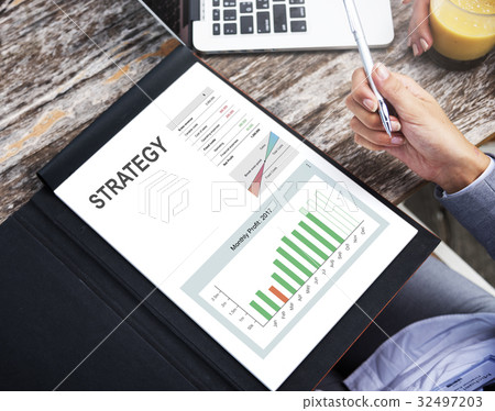 Hands working on notebook network graphic overlay Hands working on notebook network graphic overlay 32497203