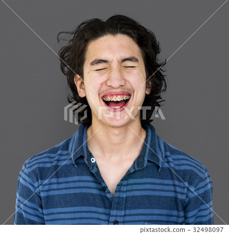 Young adult guy is laughing Young adult guy is laughing 32498097