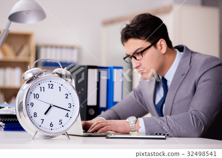 Businessman failing to meet the deadlines Businessman failing to meet the deadlines 32498541