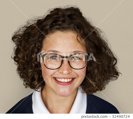 Portrait studio shoot of schoolgirl in uniform with smiling Portrait studio shoot of schoolgirl in uniform with smiling 32498724