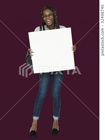 African woman holding copyspace placard African woman holding copyspace placard 32498740