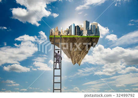 Man climbing ladder to floating island 32499792