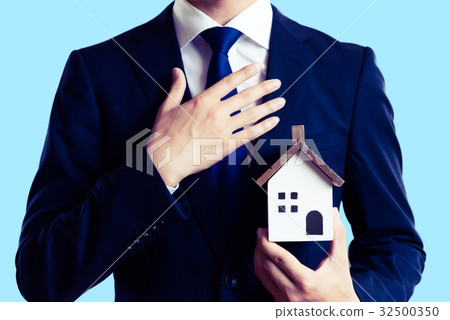 Businessman and house image 32500350