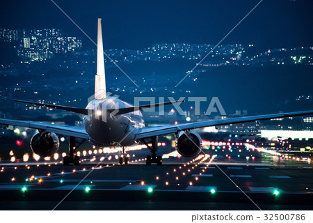 Take off at night for departing flight Boeing 777 32500786