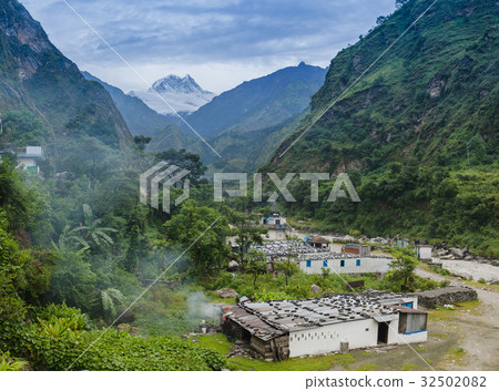 View of Nilgiri Mountain in Tatopani village. 32502082